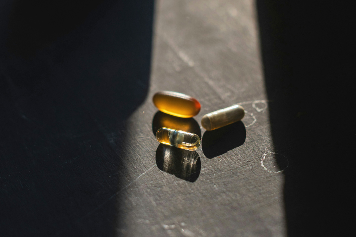 A close up of supplement pills
